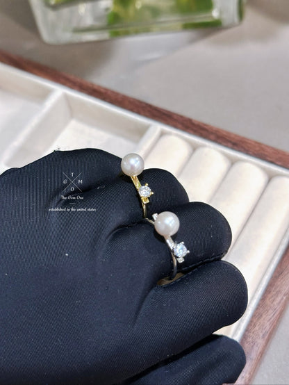 Elegant Pearl and Cubic Zirconia Engagement Ring