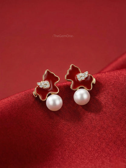 The "Dynamic Luster" Pony Earrings (7-8mm Cultured freshwater Pearl)