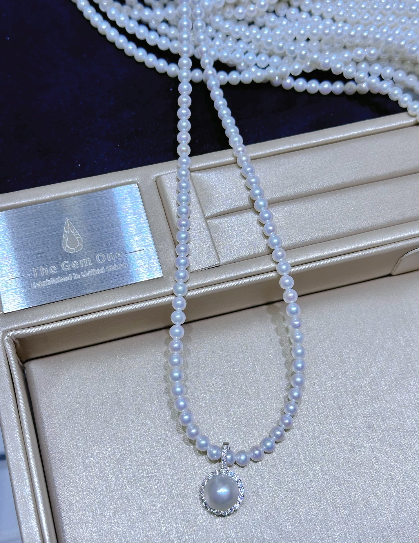 Elegant South Sea Cultured Pearl pendant with Freshwater Pearl in Sterling silver