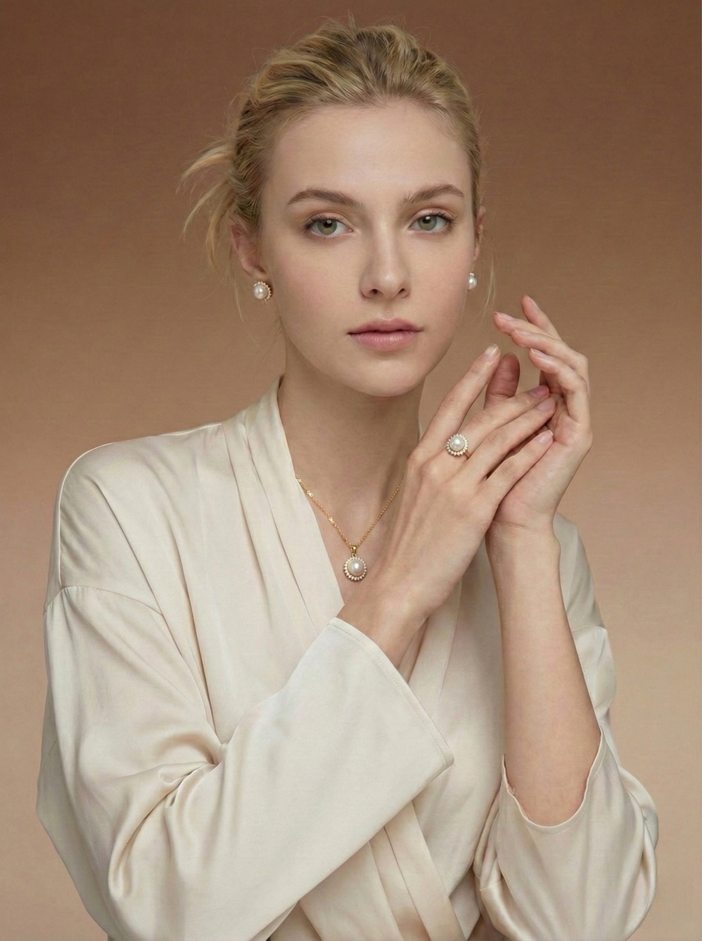 Regal Pearl and Gold Jewelry Set with Necklace, Earrings, and Ring