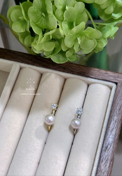 Elegant Pearl and Cubic Zirconia Engagement Ring