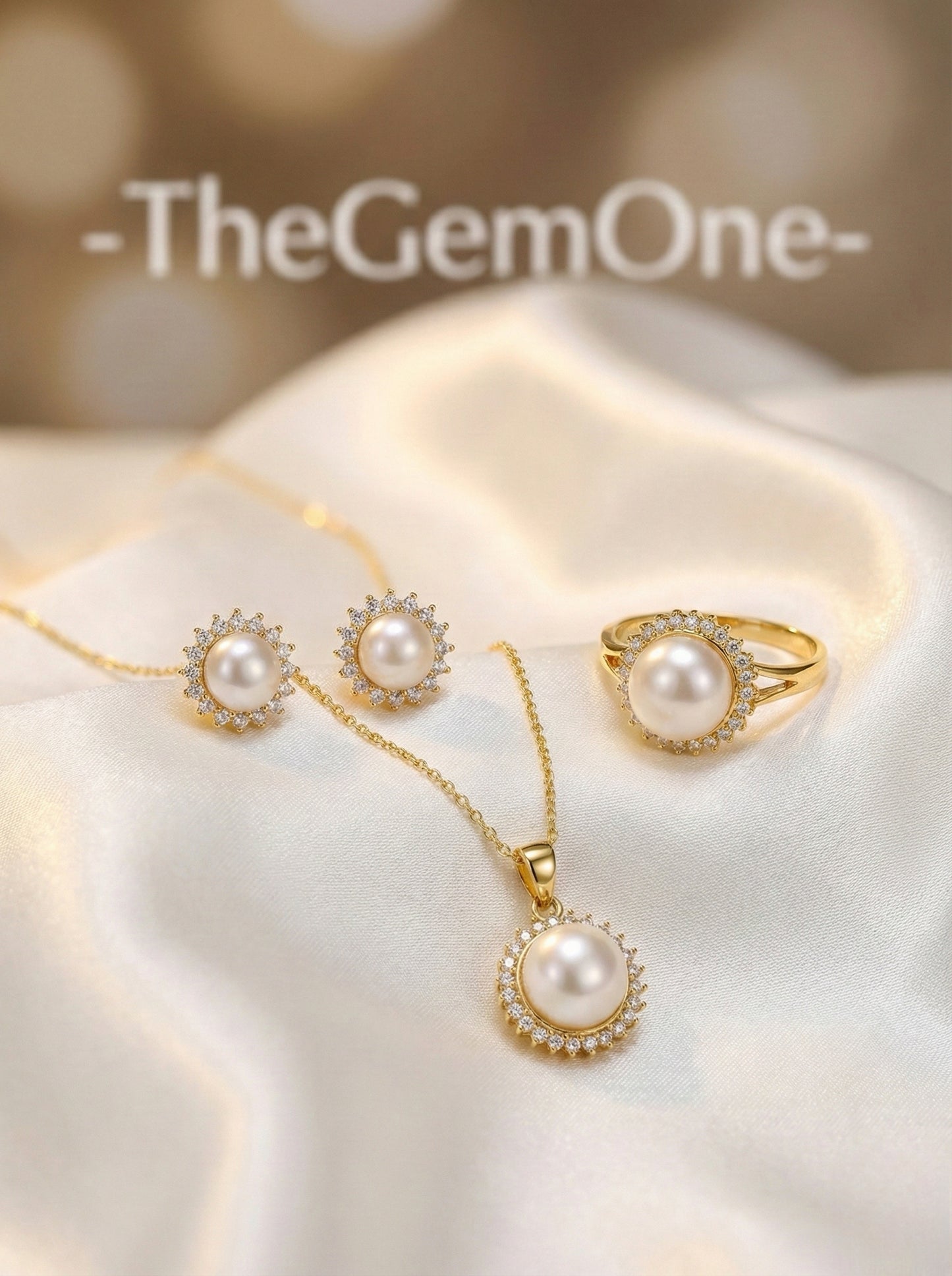 Regal Pearl and Gold Jewelry Set with Necklace, Earrings, and Ring