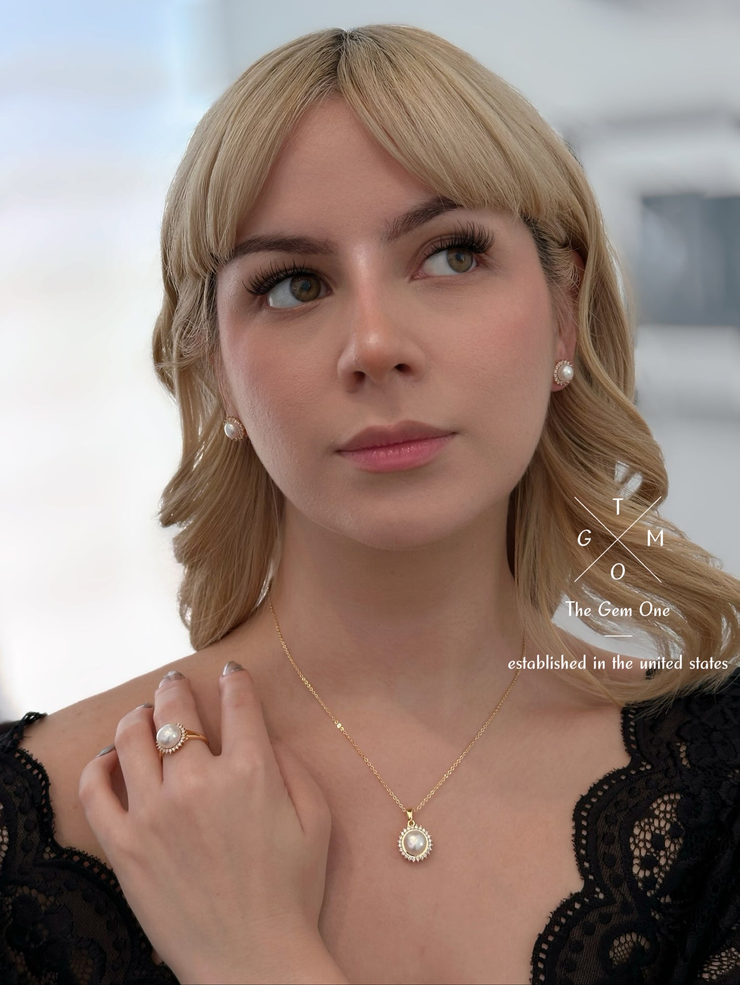Regal Pearl and Gold Jewelry Set with Necklace, Earrings, and Ring