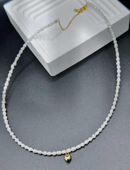 Chic Freshwater Pearl Necklace with Golden Heart Pendant