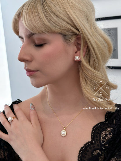 Regal Pearl and Gold Jewelry Set with Necklace, Earrings, and Ring