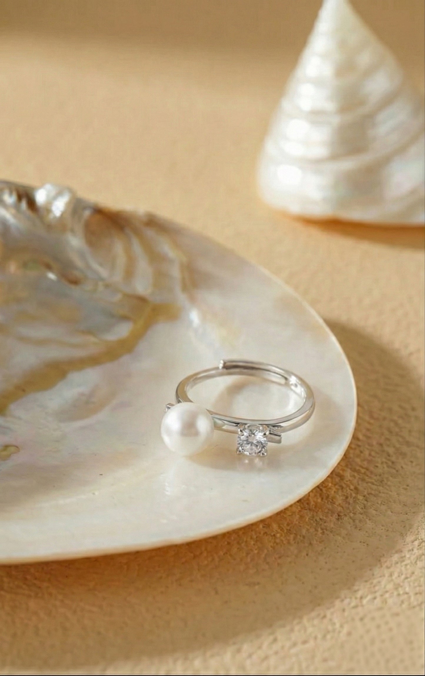 Elegant Pearl and Cubic Zirconia Engagement Ring