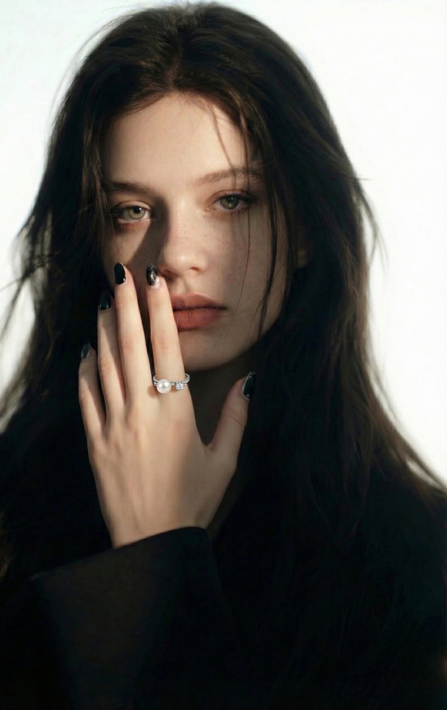 Elegant Pearl and Cubic Zirconia Engagement Ring