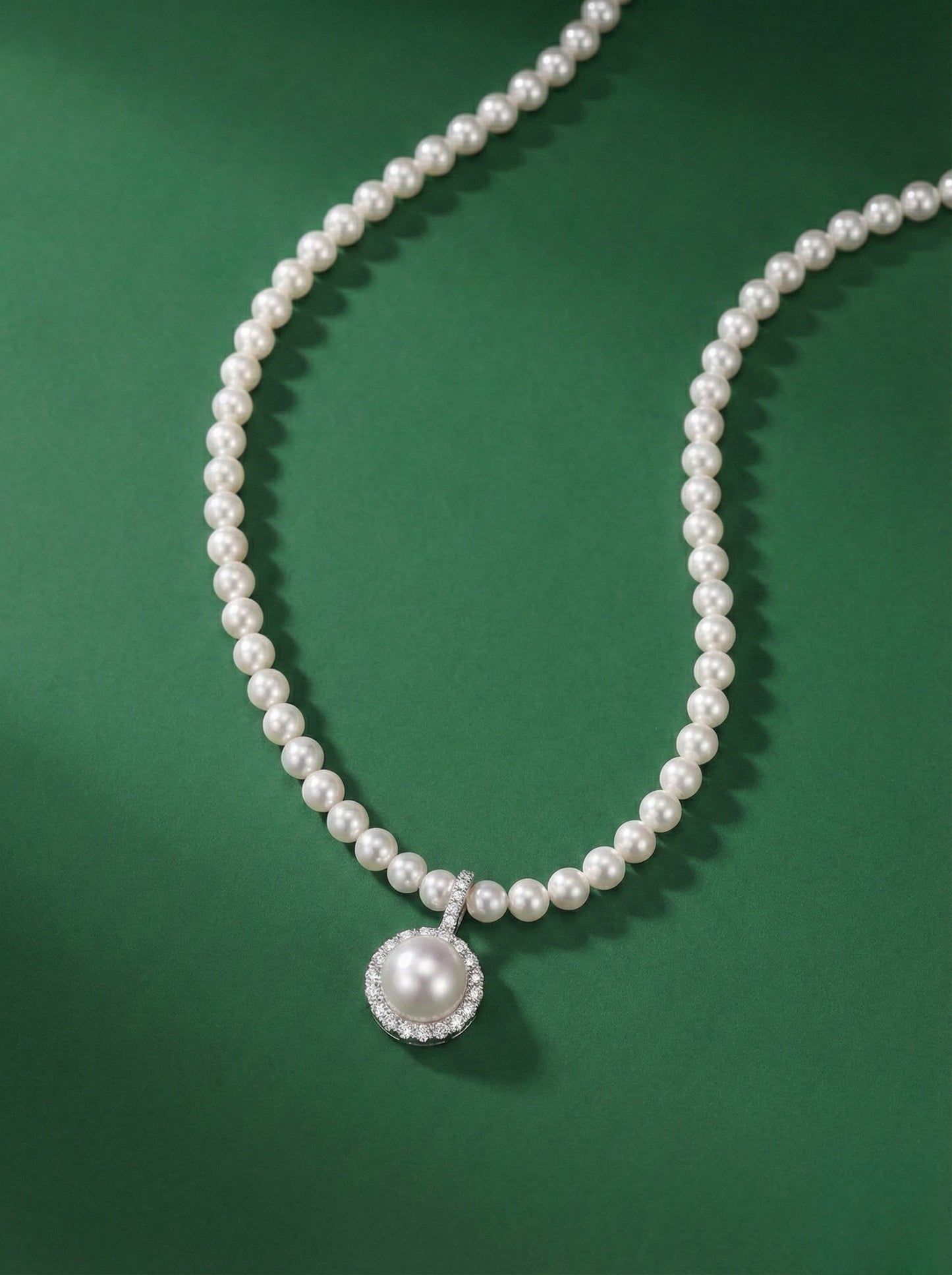 Elegant South Sea Cultured Pearl pendant with Freshwater Pearl in Sterling silver